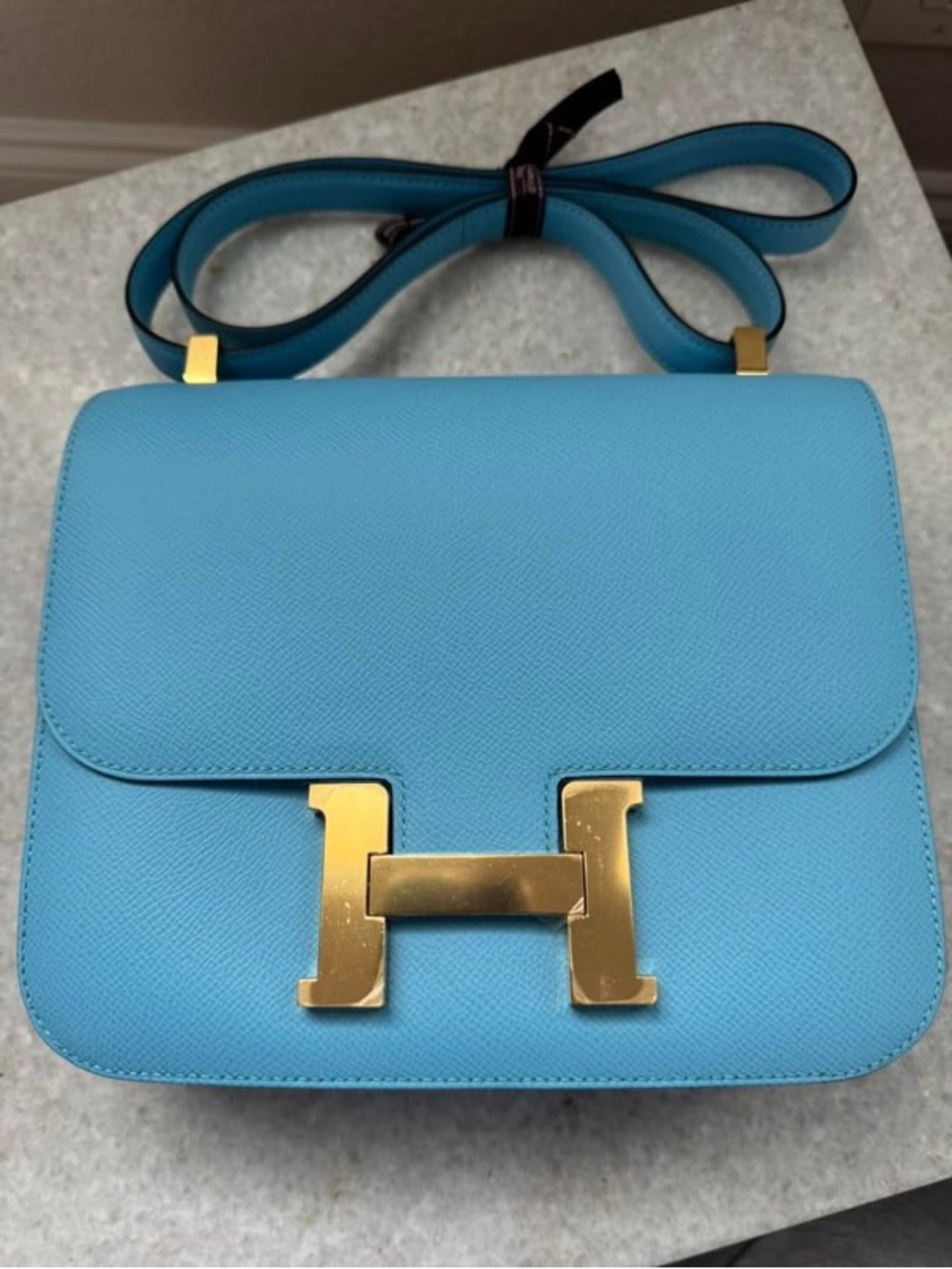 Constance 24 EPSOM Bleu Celeste Crossbody Bag with Gold H Hardware D stamp